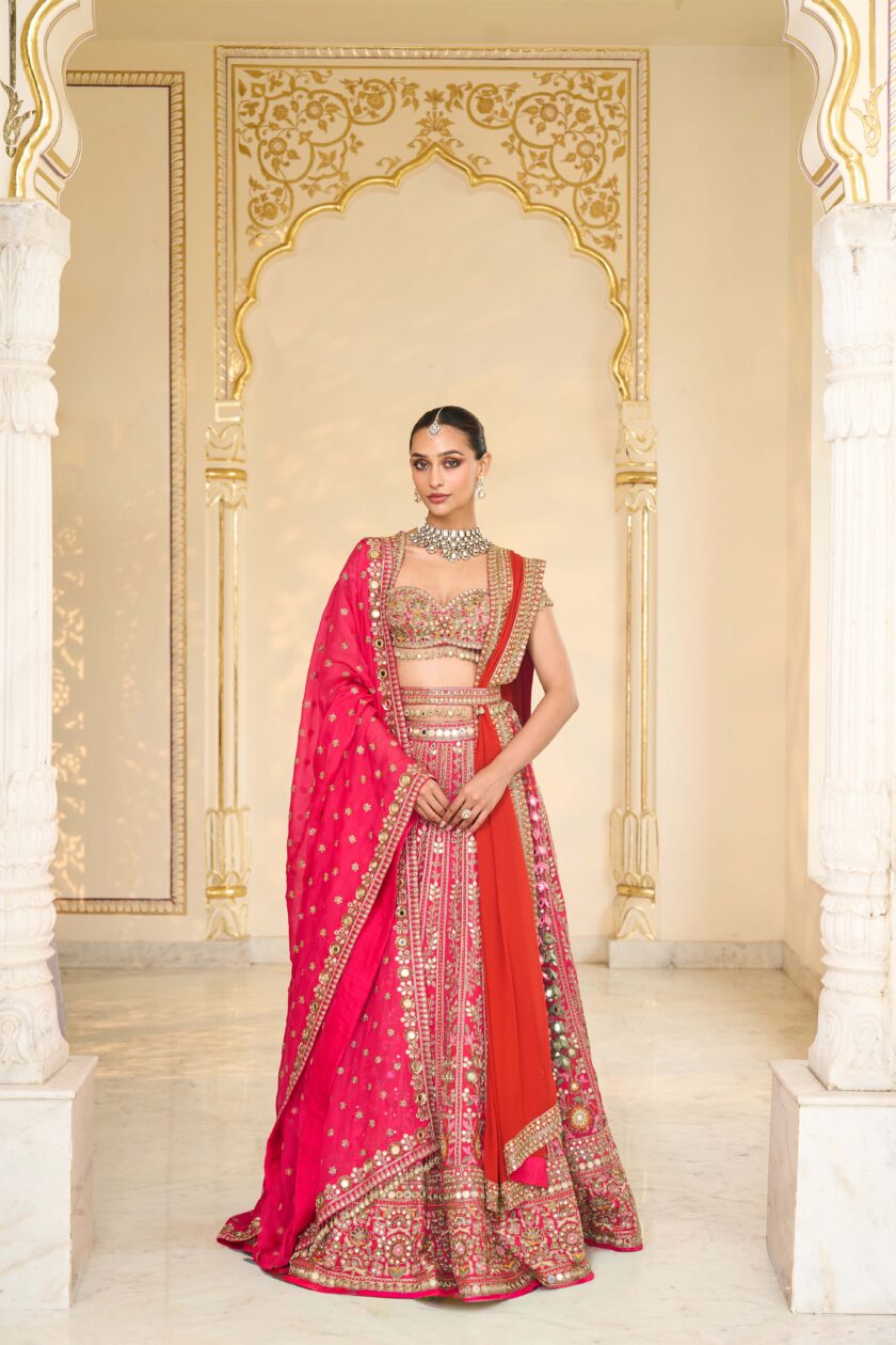 Rani pink & multi thread hand embroidered lehenga set
