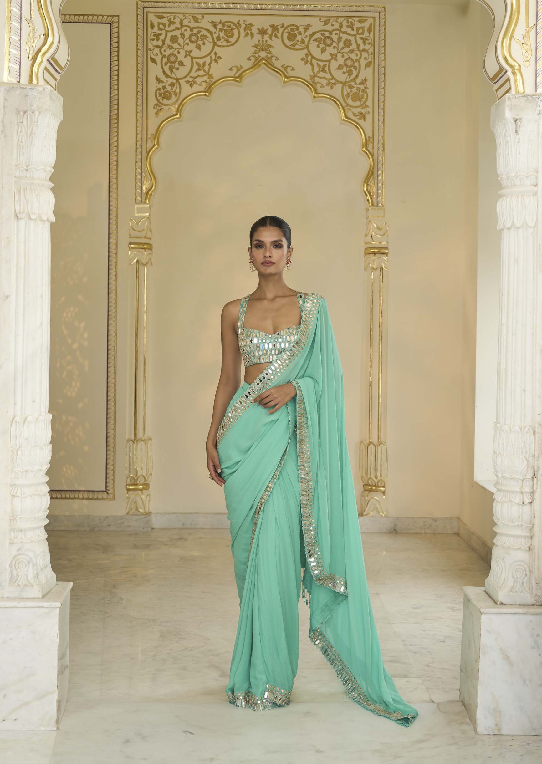 Turquoise hand embroidered classic sari set