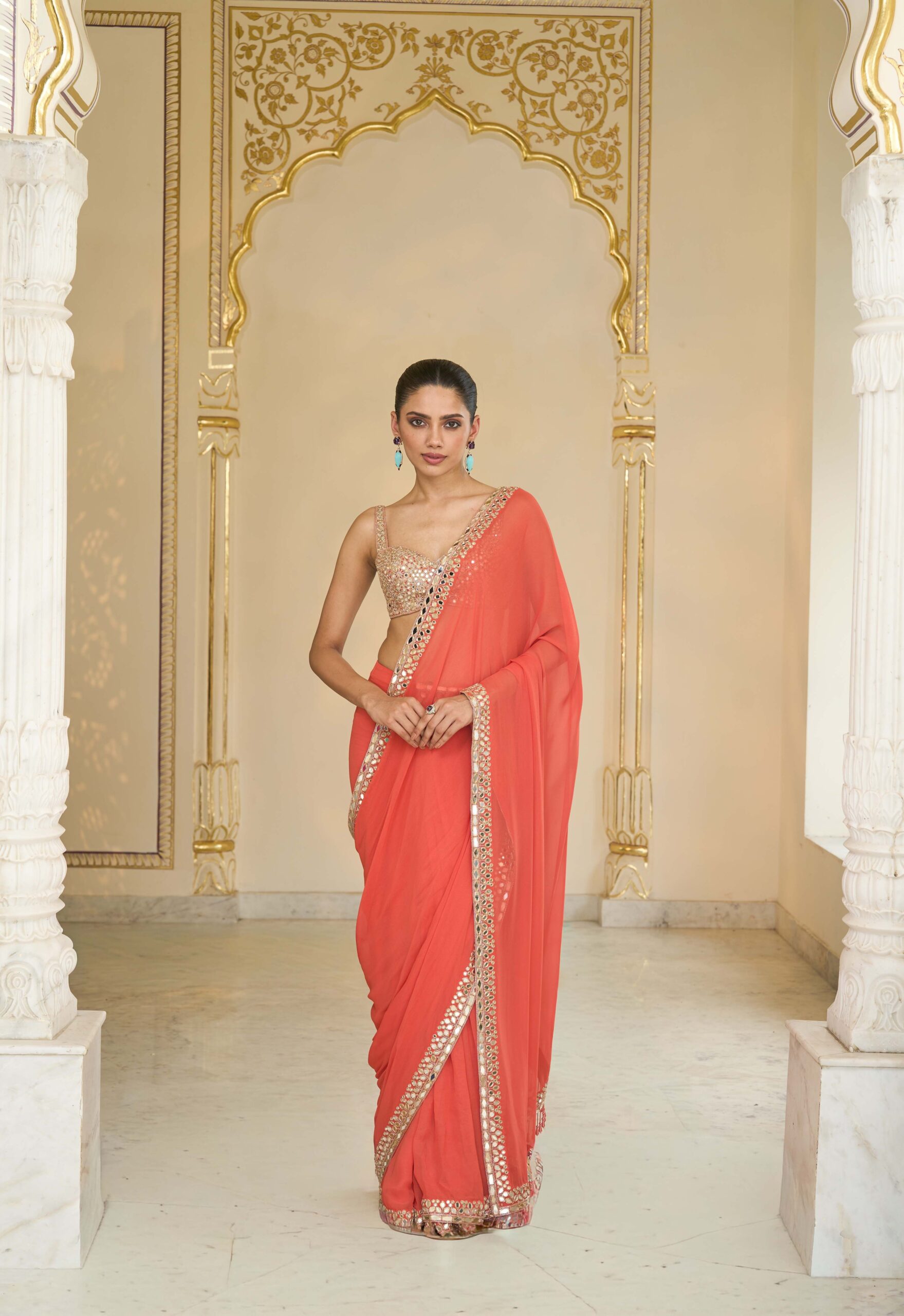 Warm coral hand embroidered classic sari set
