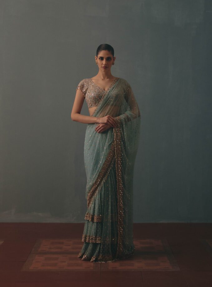 Polar sky & rose gold hand embroidered tiered net sari set