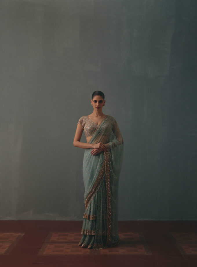 Polar sky & rose gold hand embroidered tiered net sari set