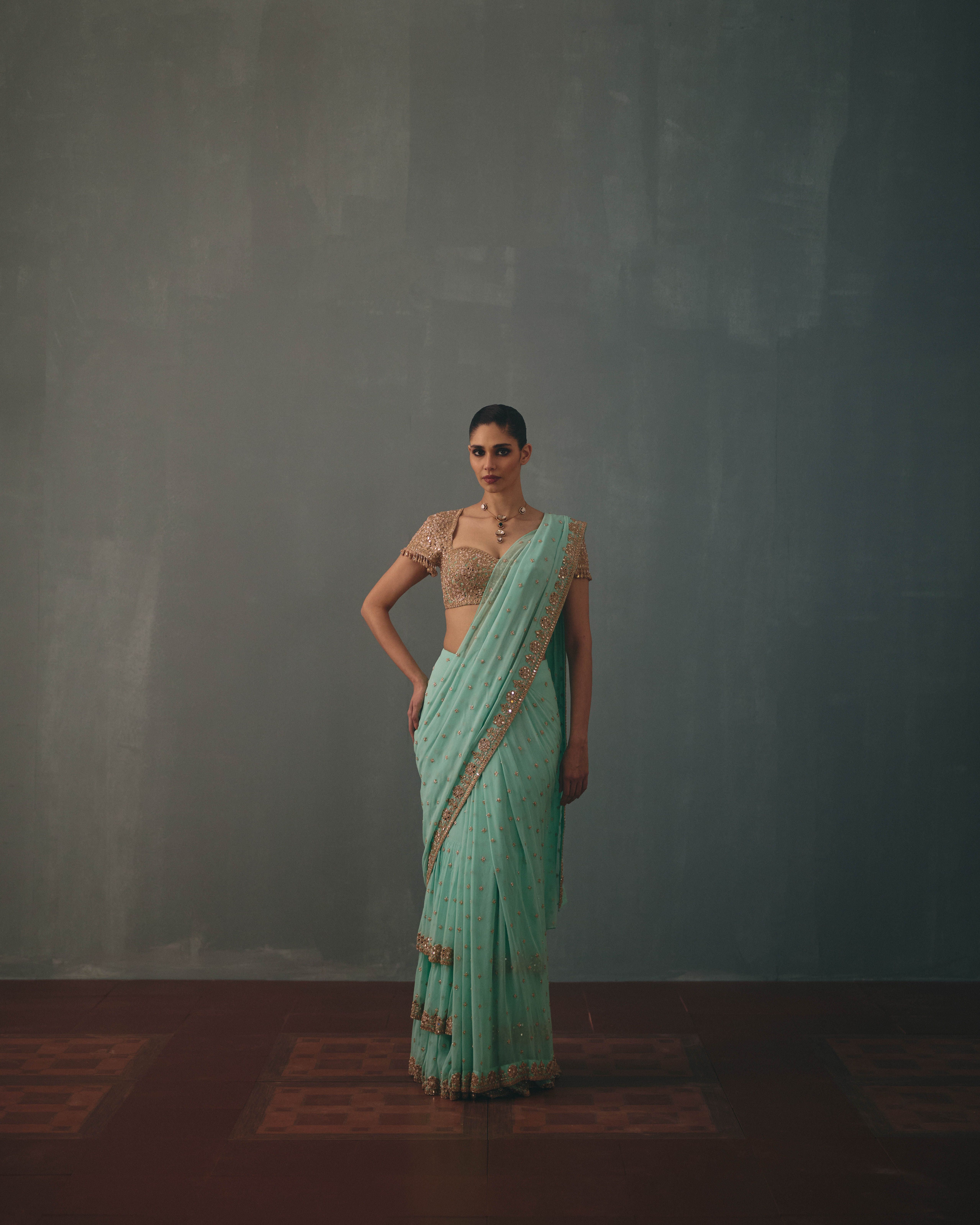 Light turquoise & rose gold hand embroidered tiered sari set