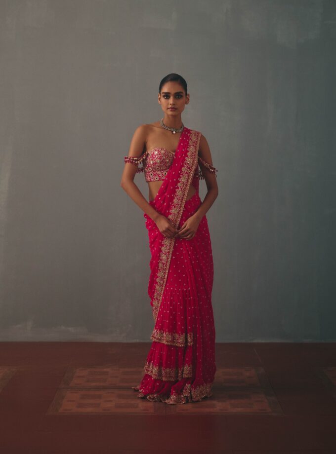 Rani pink & rose gold hand embroidered tiered sari & corset blouse set