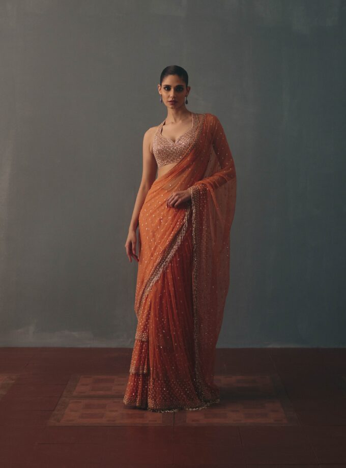 Peach fuzz & rose gold hand embroidered tiered net sari set